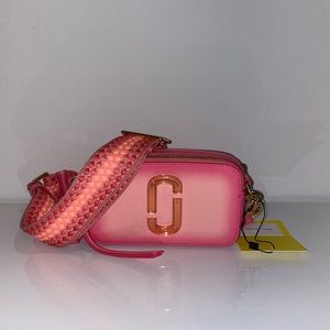 Brand New with tags. Marc Jacob’s hand sprayed snapshot bag.